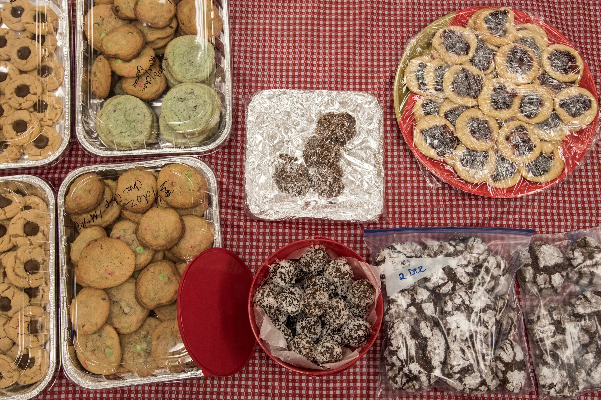 PETERSON AIR FORCE BASE, Colo. – The Peterson, Schriever, and Cheyenne Mountain Spouses’ Club collects cookies for the troops at the Peterson Chapel on Dec. 8, 2015. The annual event collected homemade desserts for dorm residents and those at 24-hour facilities. (U.S. Air Force photo by Senior Airman Tiffany DeNault)