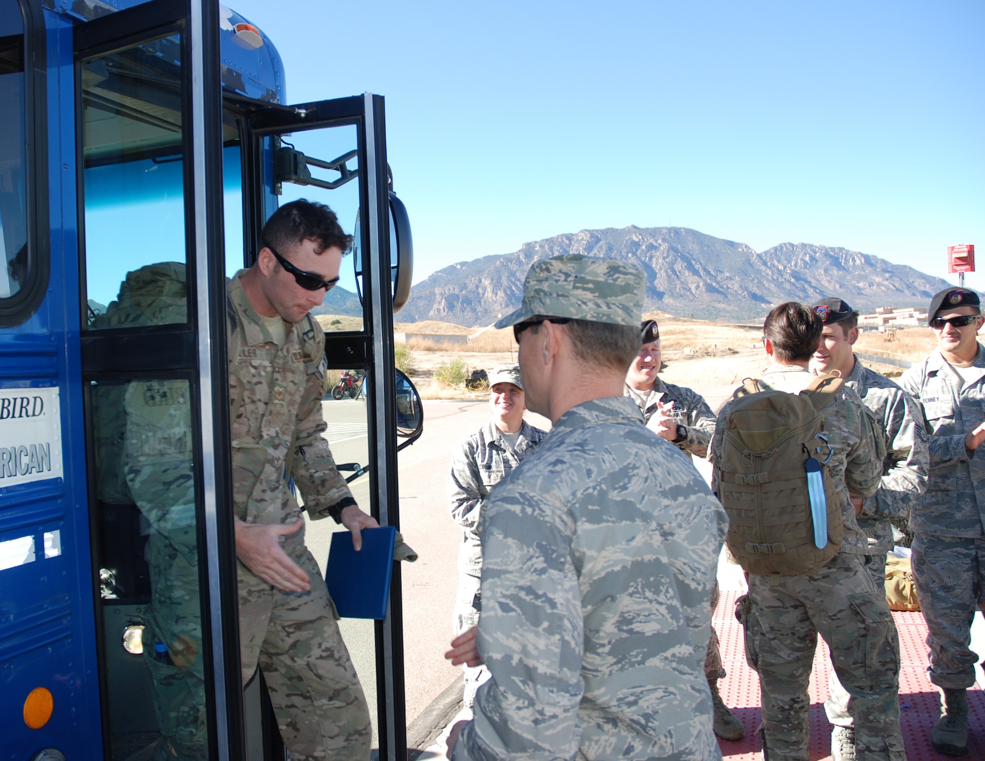 FORT CARSON, Colo. - A member of the 13th Air Support Operations Squadron Tactical Air Control Party is welcomed home Nov. 3, 2015, by his comrades after a deployment. TACP members deploy on a regular basis in support of the 4th Infantry Division, Ft. Carson where the squad is also located. (U.S. Air Force Photo by Dave Smith)