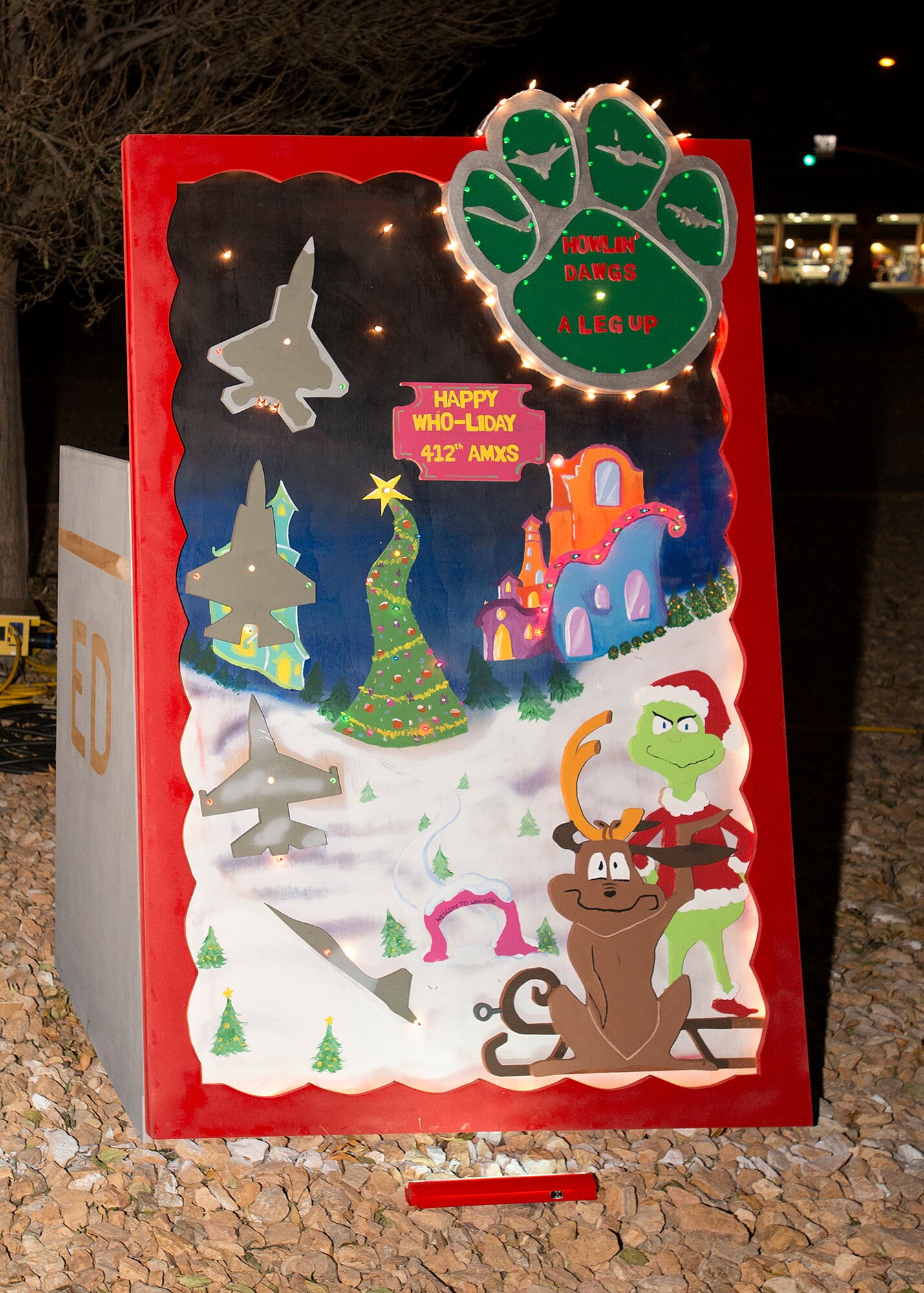 The 412th Aircraft Maintenance Squadron took first place for their holiday card in the 2015 Holiday Card Lane competition themed “the Grinch.” (U.S. Air Force photo by Edward Cannon)