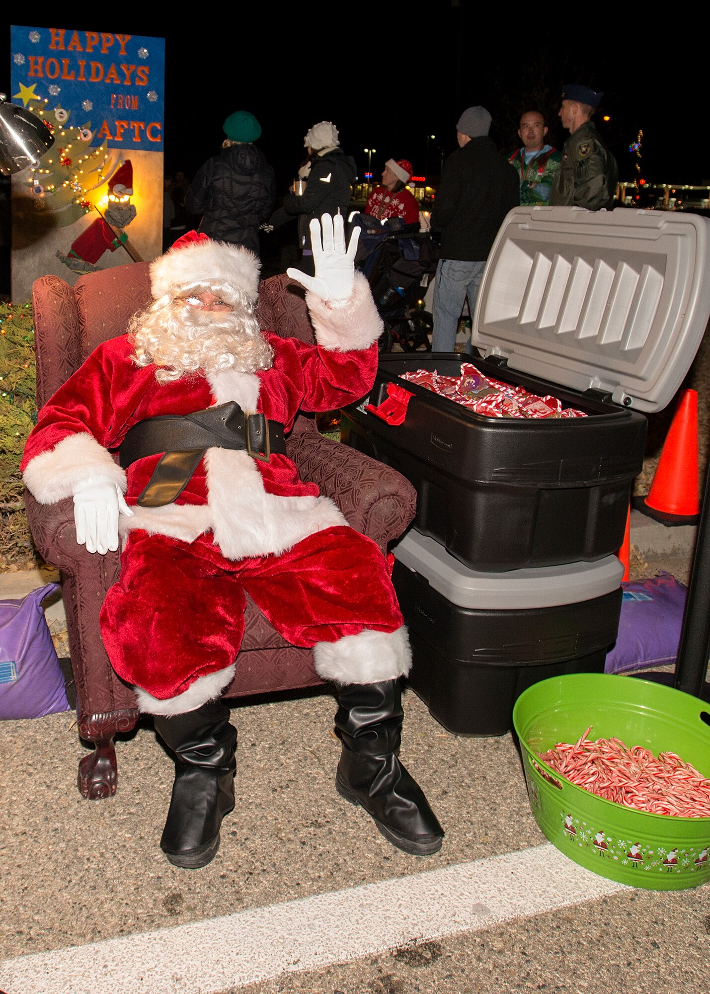 Santa Claus made a special appearance at the Annual Tree Lighting Ceremony where he gave out candy canes. (U.S. Air Force photo by Edward Cannon)