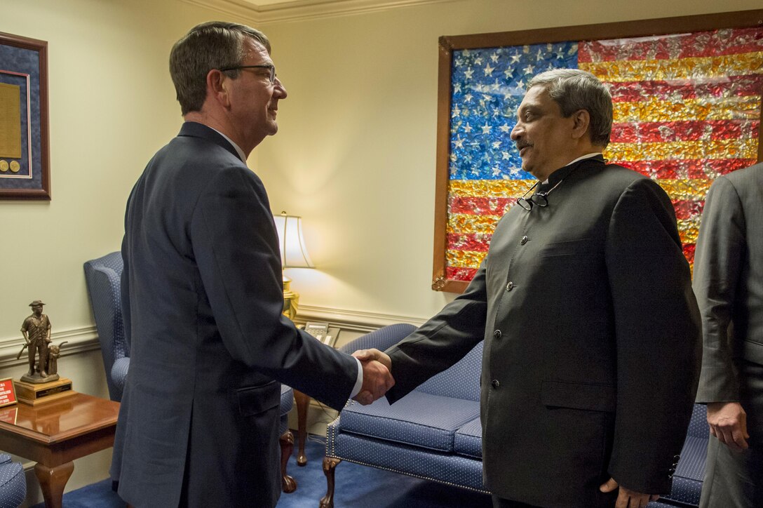 U.S. Defense Secretary Ash Carter, left, welcomes Indian Defense Minister Manohar Parrikar to the Pentagon, Dec. 9, 2015. Carter later hosted a dinner where the two leaders discussed matters of mutual importance. DoD photo by Air Force Senior Master Sgt. Adrian Cadiz