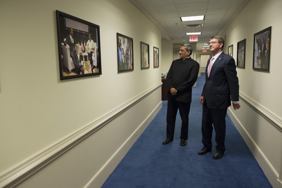 U.S. Defense Secretary Ash Carter, right, gives Indian Defense Minister Manohar Parrikar a tour before a dinner he hosted at the Pentagon, Dec. 9, 2015. DoD photo by Air Force Senior Master Sgt. Adrian Cadiz