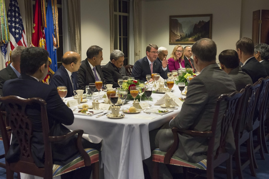 U.S. Defense Secretary Ash Carter speaks with Indian Defense Minister Manohar Parrikar during a dinner at the Pentagon, Dec. 9, 2015. DoD photo by Air Force Senior Master Sgt. Adrian Cadiz