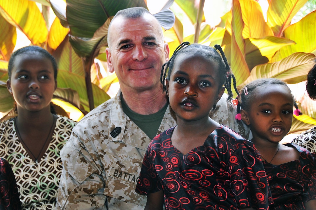 U.S. Marine Corps Sgt. Maj. Bryan Battaglia, senior enlisted advisor to the chairman of the Joint Chiefs of Staff, visited an Ethiopian orphanage where service members routinely help with building projects and playing with children in Dire Wawa, Ethiopia, April 21, 2013. This was one of many of Batagglia's stops as part of his visit to U.S. Africa Command. Dod photo by Army Master Sgt. Terrence Hayes
