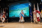 A captivating display of traditional dance by the featured group of Grass Dancers provided a historical snapshot into Indian culture. Moving rhythmically to traditional Indian music and colorfully dressed, the dancers performed specialized movements, each conveying specific meaning. 