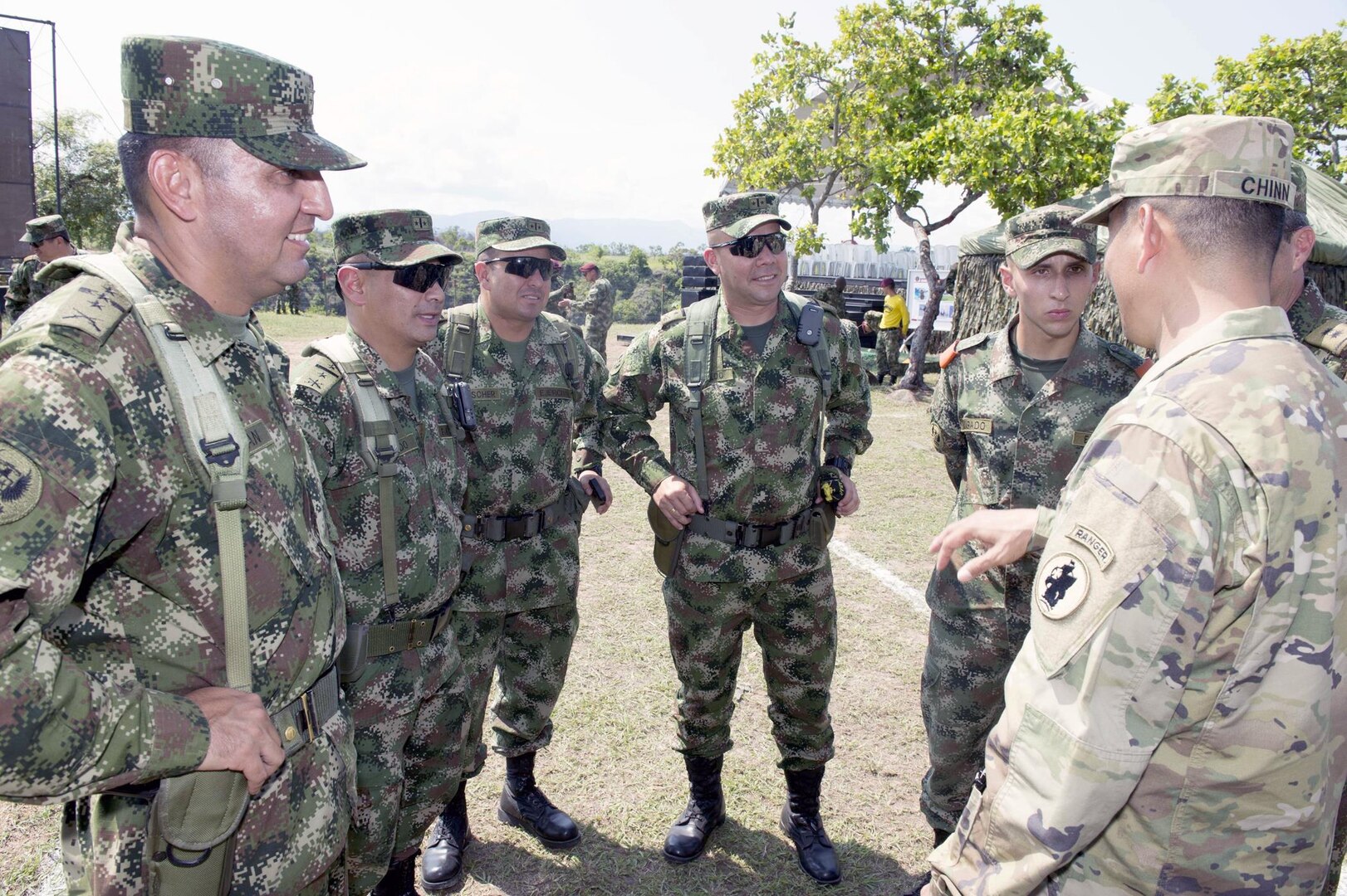 Maj. Gen. K.K. Chinn, commanding general of Army South, talks with Colombian soldiers after a military demonstration in Tolemaida, Colombia, Nov. 20. Chinn was there as part of the Commanders Conference of the American Armies, which the U.S. hosts next. The CAA was founded in 1960 and is a military organization of 20 member armies from the American continents.