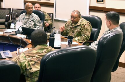 Chief Warrant Officer 5 David Williams (second from right), senior chief warrant officer advisor to the Army staff, discusses the benefits of creating a senior chief warrant officer position at the command level to look after all warrant officers in the command during his visit to U.S. Army South headquarters on Fort Sam Houston Nov. 19.