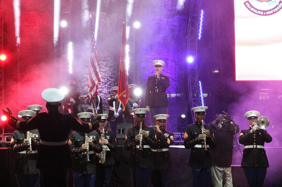 Chief Warrant Officer 3 Michael Smith, Marine Corps Band New Orleans officer in charge, sings the national anthem during the Bayou Classic Battle of the Bands show on Nov. 27, 2015. The Marine Corps has been partners with the Bayou Classic for the past 15 years as a way to connect and strengthen the United States Marine Corps’ relationship with Historically Black College Universities while also reinforcing the idea of the armed services as a viable career option for college and high school graduates. (U.S. Marine Corps photo by Sgt. Rubin J. Tan/Released)