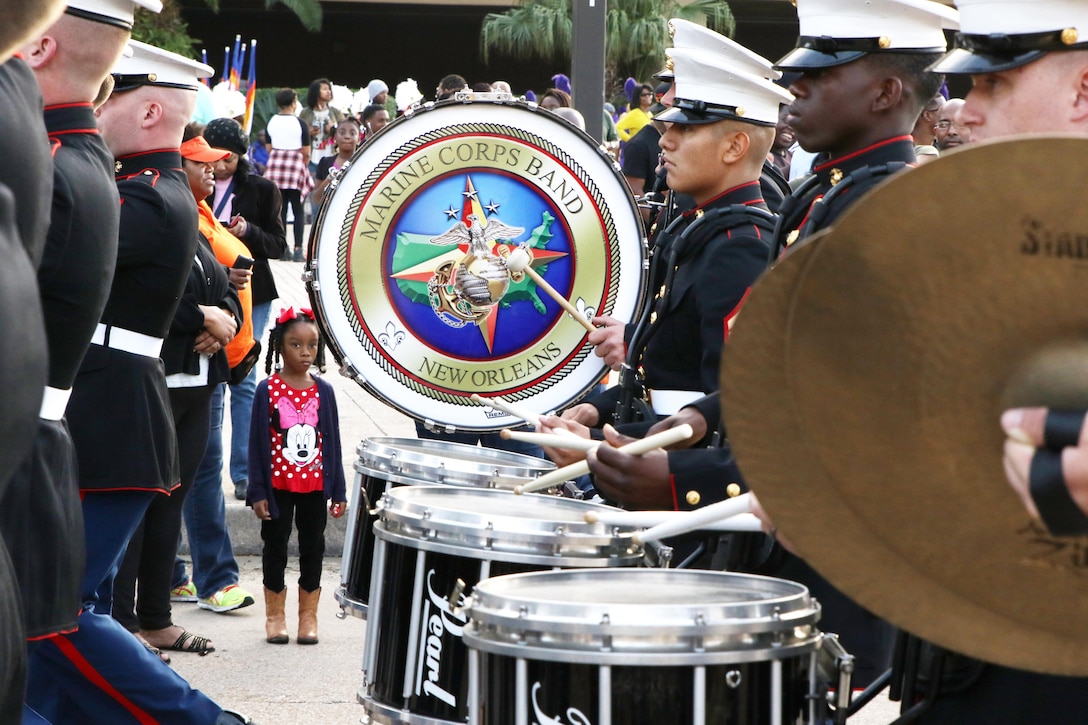 The Marine Corps Band New Orleans marches down the streets of New Orleans during the Bayou Classic Thanksgiving Parade in New Orleans on November 26, 2015. The Bayou Classic is the annual series of fan events and leading up to the rivalry football game between Southern University and Grambling State University held the week of Thanksgiving. (U.S. Marine Corps photo by Sgt. Rubin J. Tan/Released)