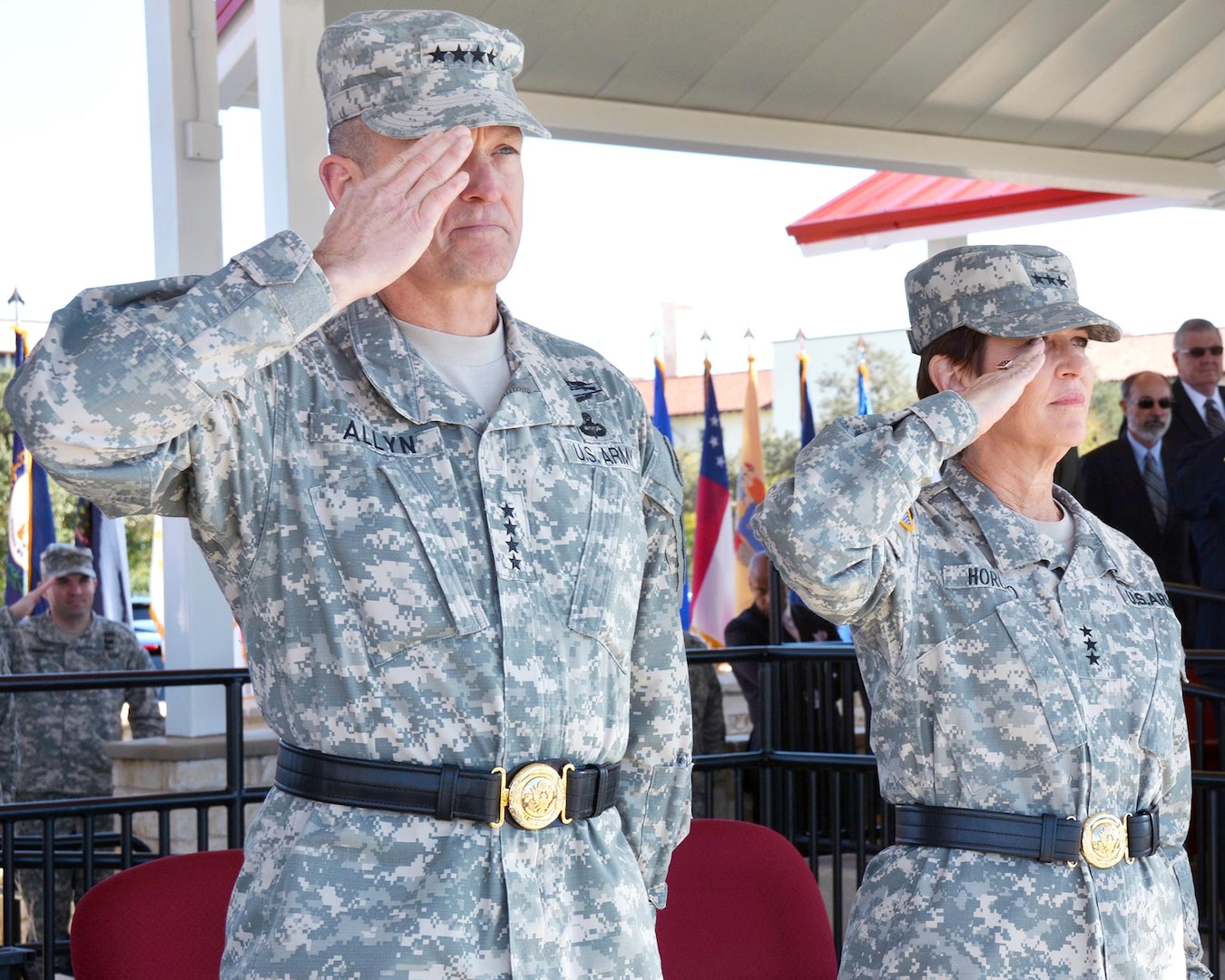 Army Vice Chief of Staff Gen. Daniel B. Allyn (left) and outgoing Army Surgeon General and Commanding General of the U.S. Army Medical Command Lt. Gen. Patricia D. Horoho salute during her relinquishment of command ceremony at MacArthur Parade Field on Fort Sam Houston Dec. 3.
