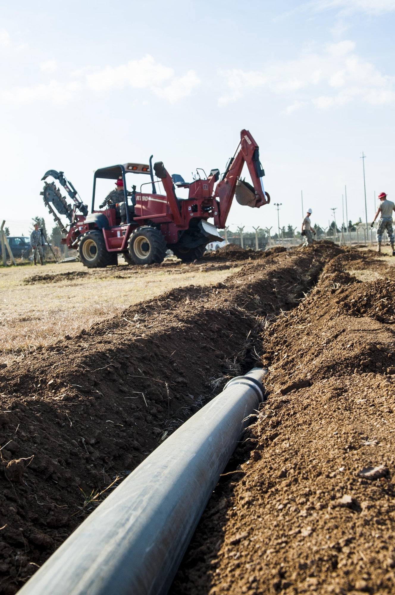 Airmen from the 39th Communications Squadron install underground communications lines, the framework for communication infrastructure Nov. 18, 2015, at Incirlik Air Base, Turkey. The underground communication cable is the first of many steps to establishing a communications infrastructure. The squadron works to establish and maintain new and old infrastructure to ensure Incirlik and Operation Inherent Resolve missions are accomplished. (U.S. Air Force photo/Staff Sgt. Jack Sanders)