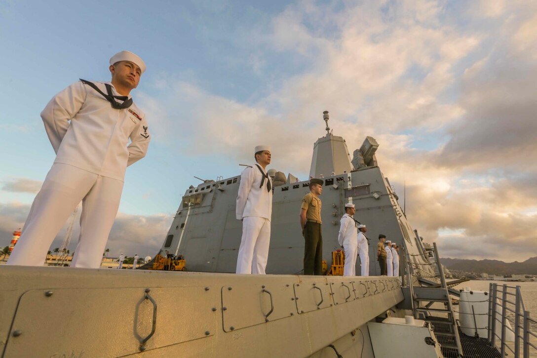 PEARL HARBOR, Hawaii (Dec. 6, 2015) U.S. Marines and Sailors man the rails as the USS Anchorage (LPD 23) pulls into port in Hawaii. Hawaii is the 15th Marine Expeditionary Unit’s last port call before heading home after their WESTPAC 15 deployment. (U.S. Marine Corps photo by Sgt. Jamean Berry/Released)