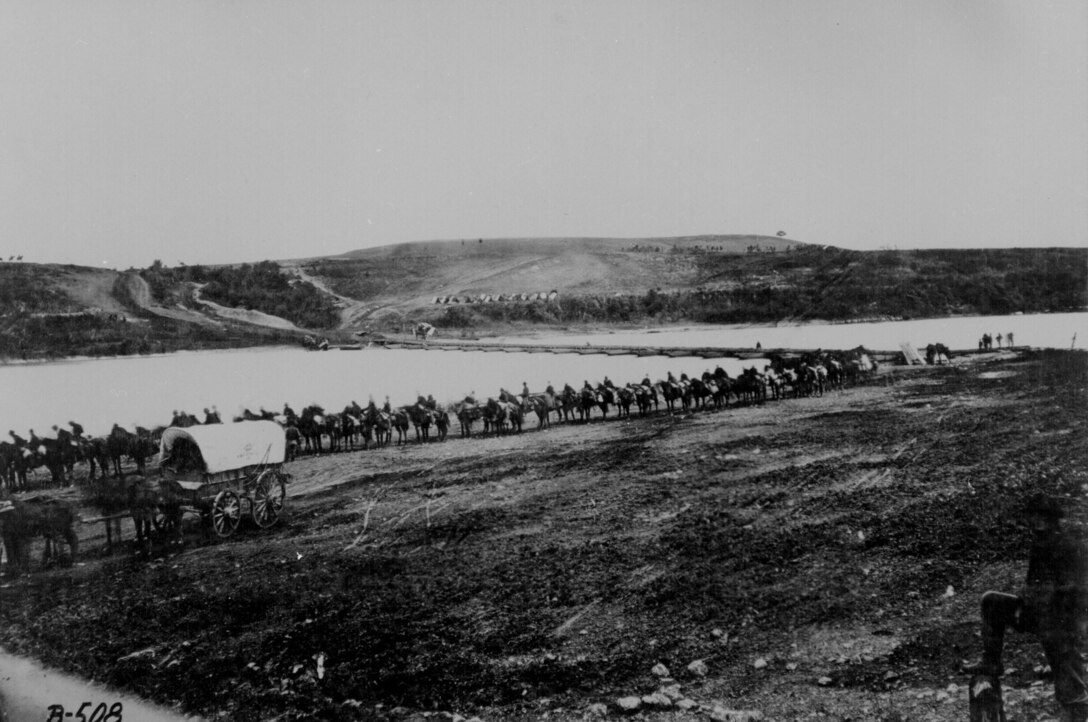 The Federal Calvary Column stand along the Rappahannock River, ready to cross the pontoon bridges and attack the city.