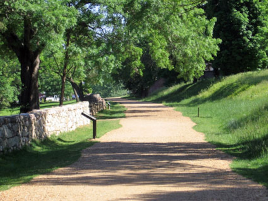 This is a portion of the stone wall that Confederate troops used as a shield from Union fire Dec. 13, 1862 during the Battle of Fredericksburg.  The stone wall worked well, as only 300 Confederate troops were hit by enemy fire, compared to 8,000 on the Union side.  Parts of the stone wall were rebuilt in the 1930s and in 2004.