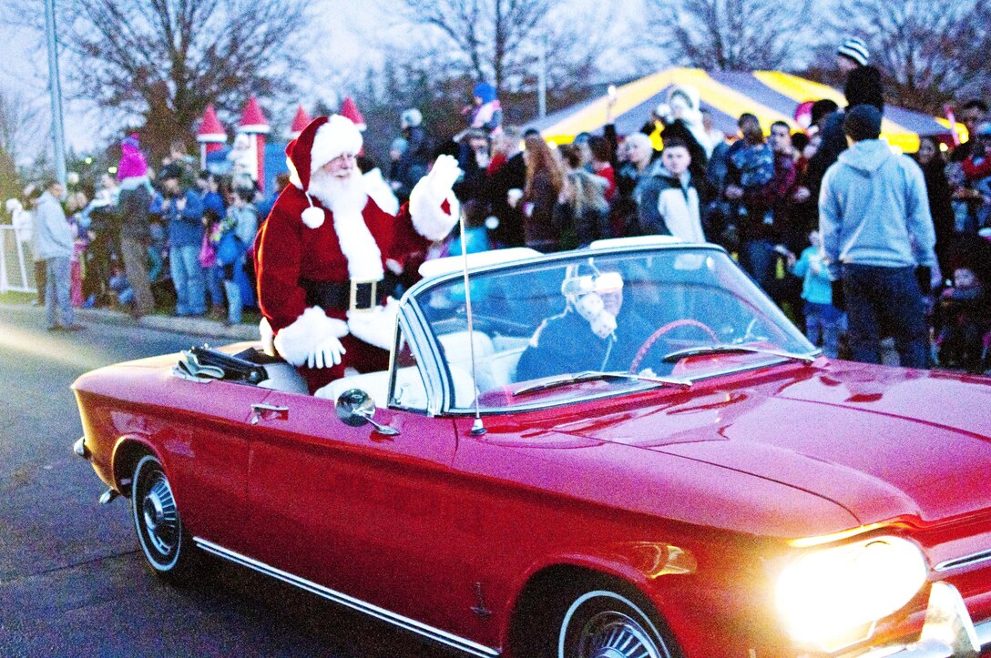 Santa Claus visits military families aboard Marine Corps Base Quantico during their Fifth Annual Base Christmas Tree Lighting Ceremony at Lejeune Hall Dec. 6.