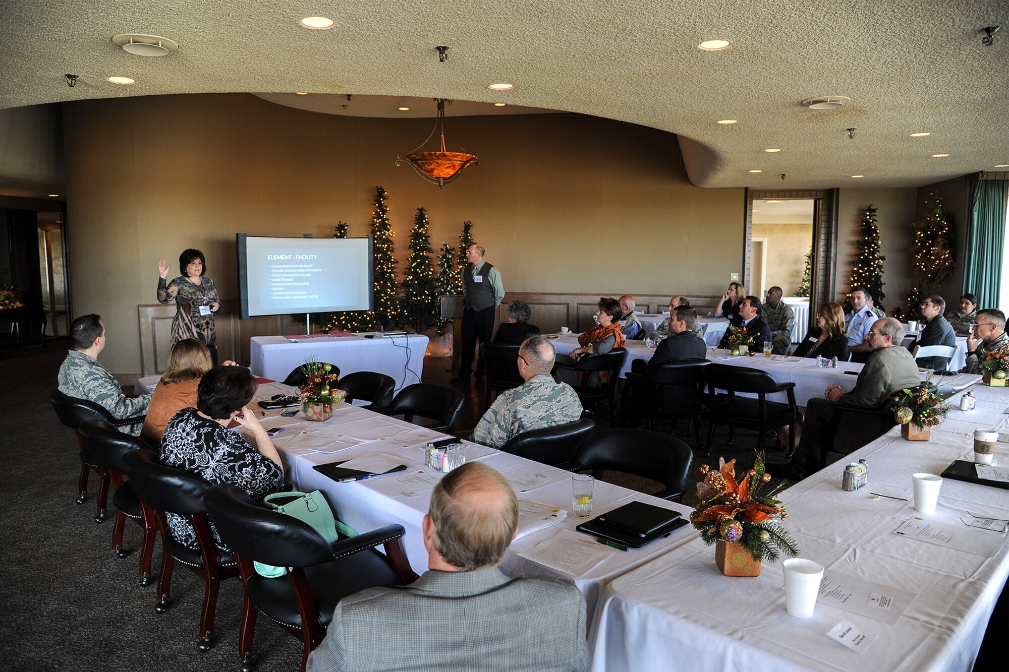 Goodfellow Air Force Base and San Angelo community leaders discuss current and future projects to enhance aspects of both the base and the community at the San Angelo Country Club in San Angelo, Texas, Dec. 9, 2015. Some of the projects included a partnership between the 17th Medical Group and Shannon Medical Center for emergency training, a joint training facility via a partnership between the 17th Security Forces Squadron and Tom Green County Sherriff’s Department, and a partnership between the 17th Training Wing’s Sexual Assault Prevention and Response team and the Concho Valley Rape Crisis Center. (U.S. Air Force photo by Airman 1st Class Devin Boyer/Released)