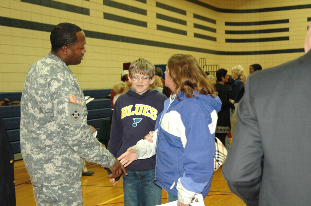 Col. Anthony Mitchell, St. Louis District commander speaks with concerned citizens during the Formerly Utilized Sites Remedial Action Program (FUSRAP) public meeting, Dec. 9, 2015 at the James J. Eagan Community Center in Florissant, Mo. 