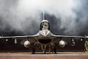 Lt. Col. Mark Sletten, an F-35 Lightning II program integration officer, lowers the canopy on an F-16 Fighting Falcon before taxiing to take off Dec. 7, 2015, at Eielson Air Force Base, Alaska. More than 30 maintenance Airmen worked an early shift to help launch several jets to Tyndall Air Force Base, Fla., for Checkered Flag 16-1, a large-force exercise that simulates a large number of aircraft in a deployed environment to cross-check weapons systems. (U.S. Air Force photo/Master Sgt. Joseph Swafford)