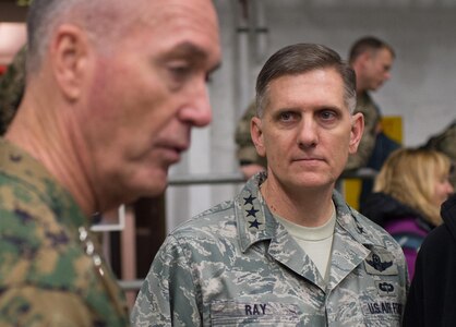 U.S. Marine Corps Gen. Joseph F. Dunford Jr., chairman of the Joint Chiefs of Staff, and Air Force Lt. Gen. Timothy M. Ray, commander of  3rd Air Force and 17th Expeditionary Air Force, talk with troops on Ramstein Air Base, Germany, Dec. 9, 2015. DoD photo by D. Myles Cullen