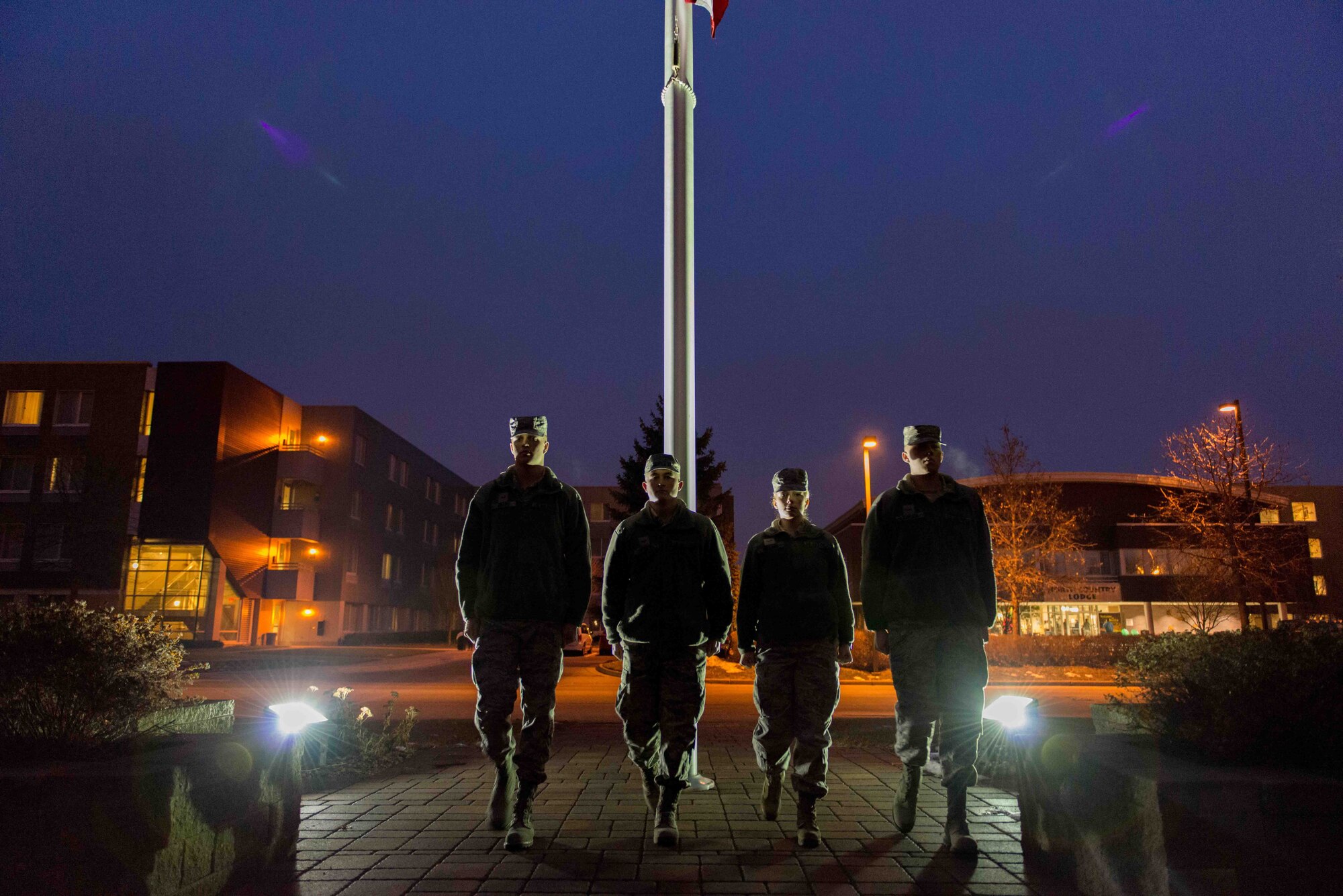Members of the 27 Aerial Port participate in a flag raising ceremony, Dec. 6 at Minneapolis-St. Paul International Airport Air Reserve Station, Minn. (U.S. Air Force photo by Staff Sgt. Trevor Saylor)


