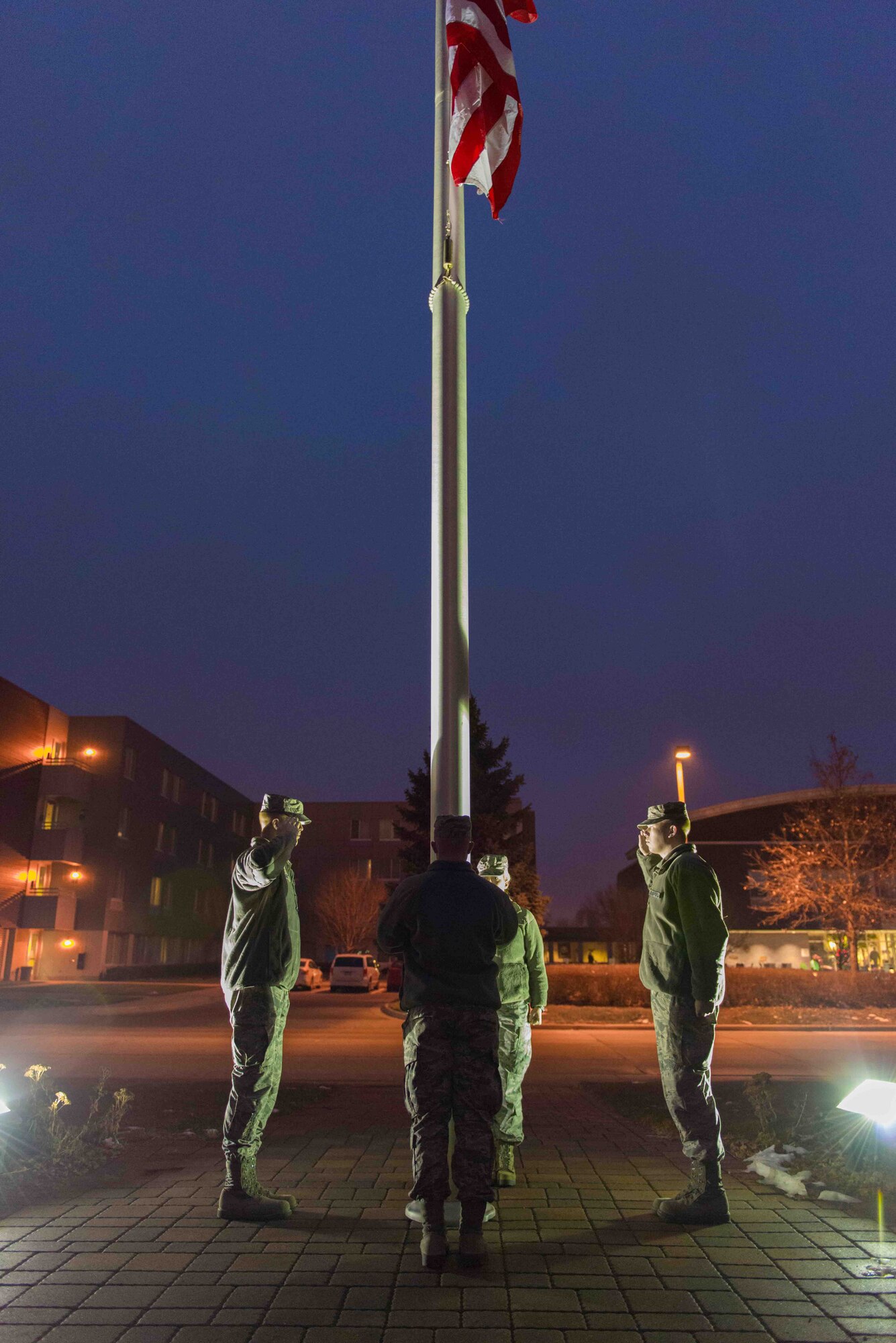Members of the 27 Aerial Port participate in a flag raising ceremony, Dec. 6 at Minneapolis-St. Paul International Airport Air Reserve Station, Minn. (U.S. Air Force photo by Staff Sgt. Trevor Saylor)


