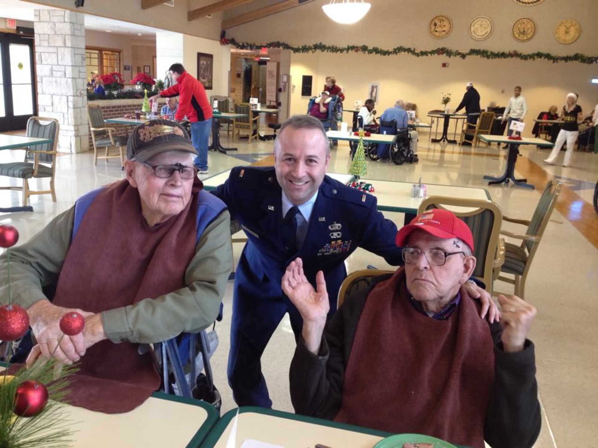 Capt. Jeff Kelly meets with veterans at the Missouri Veterans Home near Whiteman Air Force Base, Missouri.