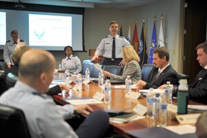 Lt. Col. Ralph E. Taylor, 628th Mission Support Group deputy commander, provides opening remarks during the Air Force Partnership Program (P4) way ahead meeting in the 628th Air Base Wing conference room on Joint Base Charleston - Air Base, S.C., Dec. 4, 2015. The P4 initiative, started approximately 12 months ago, has led to the creation of nine new money-saving programs between local community leaders  and multiple Joint Base members. (U.S. Air Force photo/Tech. Sgt. Renae Pittman)
