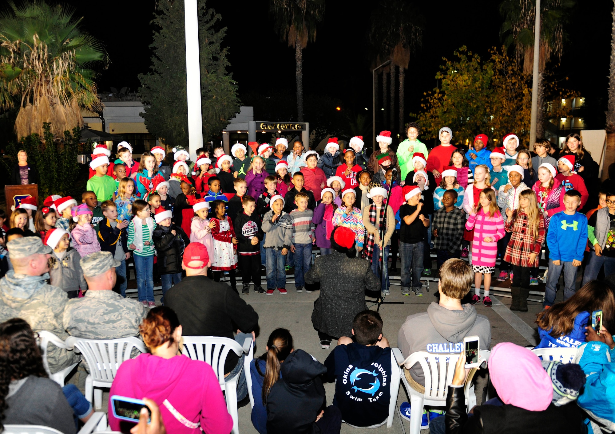 Children from the Incirlik Unit School sing holiday carols during the 2015 Incirlik Holiday Tree Lighting ceremony Dec. 1, 2015, at Incirlik Air Base, Turkey. The elementary school children sang several carols prior to the official lighting of the holiday tree. (U.S. Air Force photos by Senior Airman Krystal Ardrey/Released)