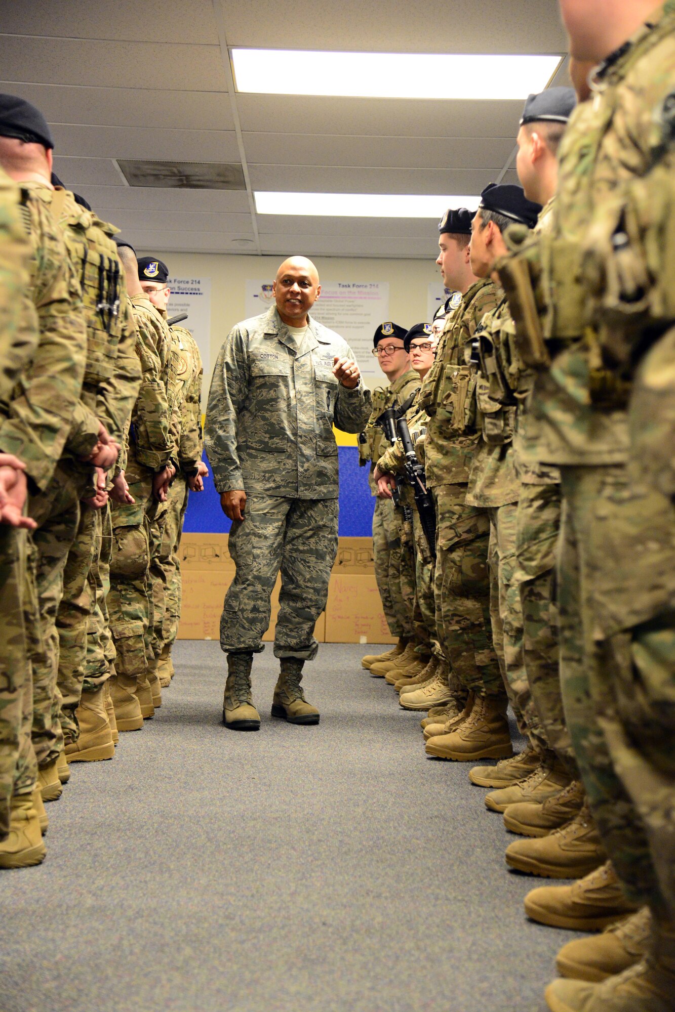 Maj. Gen. Anthony Cotton, 20th Air Force commander, visits Airmen from the 341st Missile Security Forces Squadron Dec. 7, 2015, at Malmstrom Air Force Base, Mont. Cotton introduced himself to the Airmen during guardmount and took the opportunity to discuss his views on the nation’s defense. Cotton is a former 341st Missile Wing commander, and now leads the nation's land based intercontinental ballistic missile force. (U.S. Air Force photo/Airman 1st Class Magen M. Reeves)