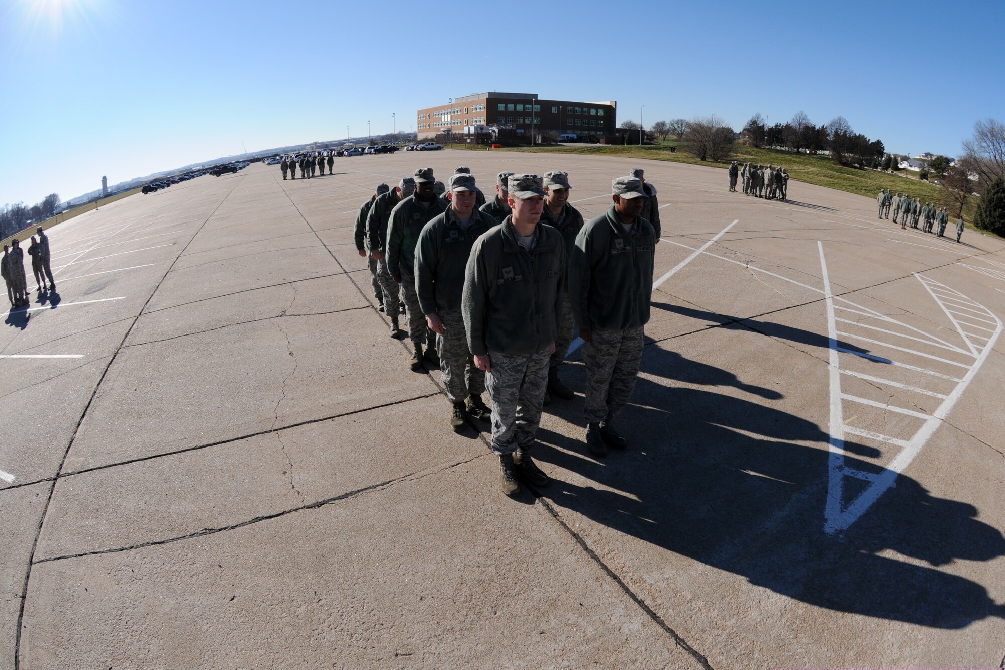 Students at the James M. McCoy Airman Leadership School at Offutt Air Force Base, Nebraska, practice marching in the parking at the school house on December 3, 2015. Airmen practice marching, giving speeches and writing papers at ALS, a requirement to make the rank of staff sergeant.  (U.S. National Guard photo by Staff Sgt. Daniel S. Ter Haar/Released)