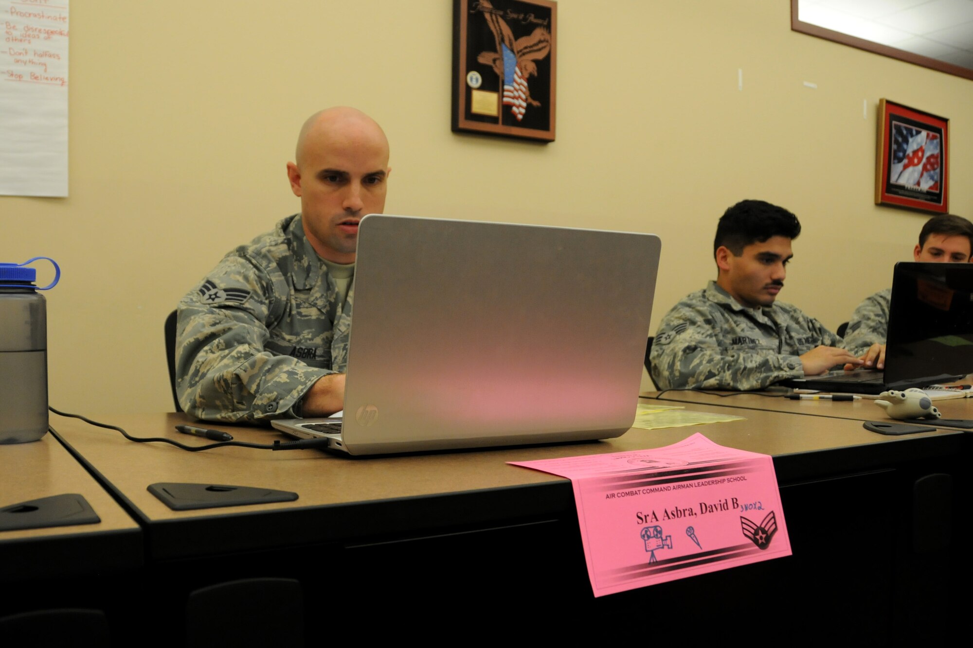 Senior Airman David B. Asbra, a public affairs specialist from the 185th Air Refueling Wing at Sioux City, Iowa, works on an assignment at the James M. McCoy Airman Leadership School at Offutt Air Force Base, Nebraska, on December 3, 2015. Airman Leadership School consists of 192 hours of training and airmen will also receive nine college credit hours towards their Community College of the Air Force degree.  (U.S. National Guard photo by Staff Sgt. Daniel S. Ter Haar/Released)
