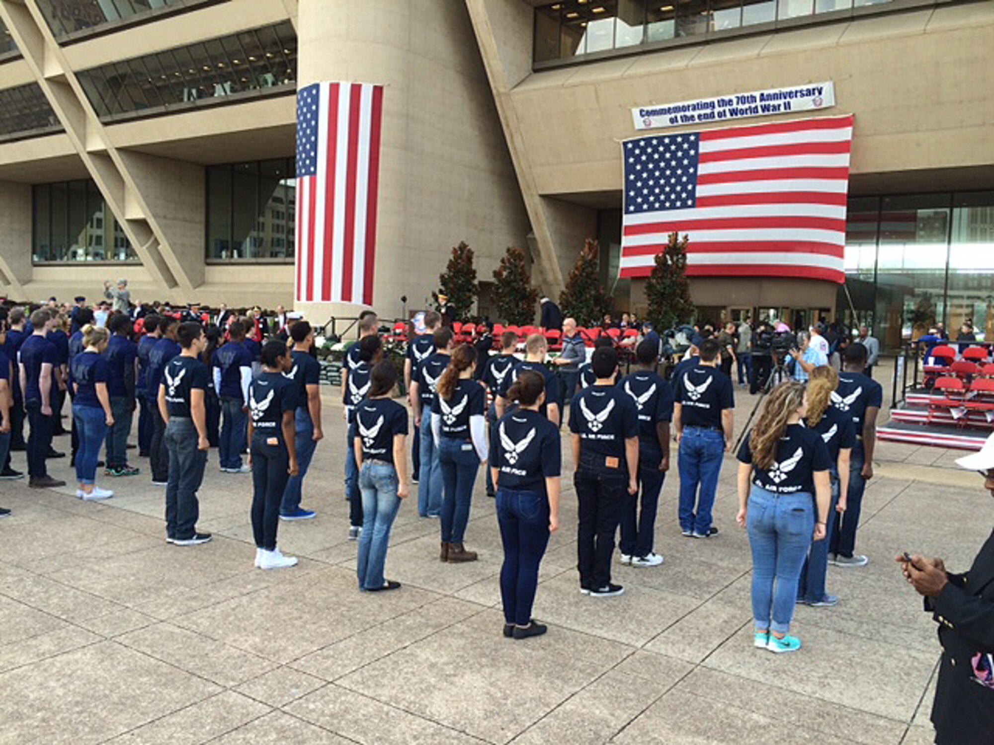 Delayed Entry Program members stand at attention just before their swear-in ceremony at Dallas City Hall, Nov. 11, 2015.  Members of the 344th Recruiting Squadron A-Flight and their DEP participated in the annual Dallas Veterans Day Parade. (U.S. Air Force photo)
