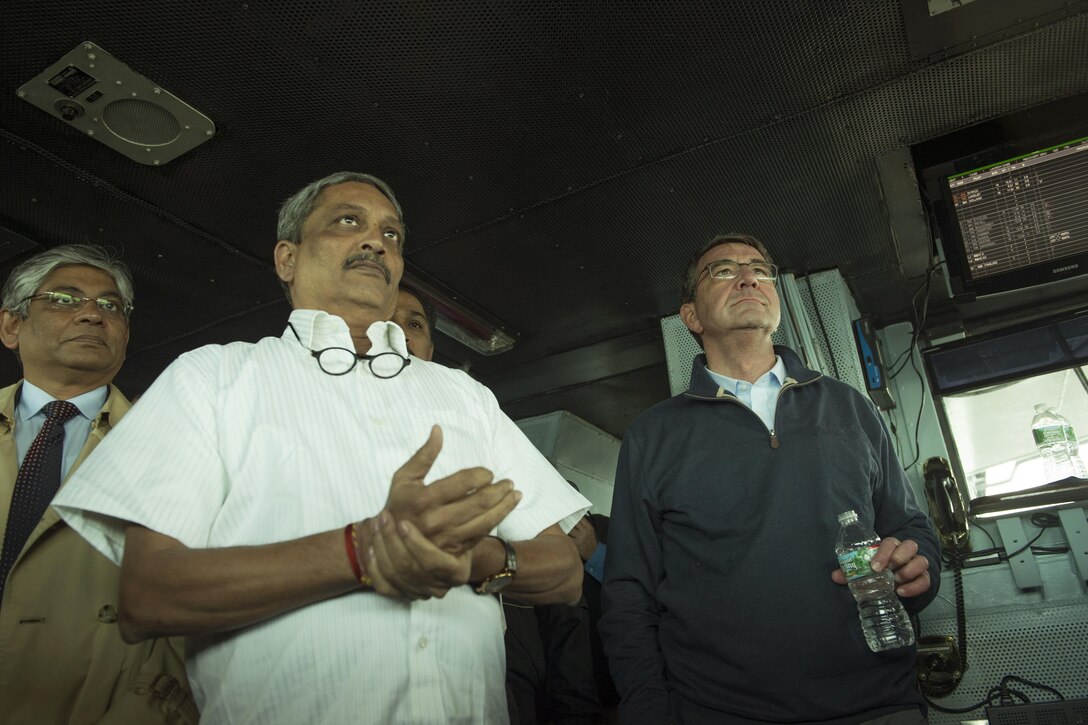 U.S. Secretary of Defense Ash Carter and Indian Defense Minister  Manohar Parrikar tour the USS Dwight D. Eisenhower Dec. 10, 2015. The two leaders toured the aircraft carrier after meeting at the Pentagon to discuss matters of mutual interest. DoD photo by Senior Master Sgt. Adrian Cadiz