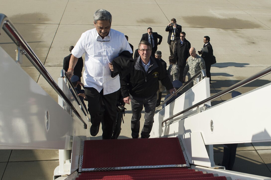 U.S. Defense Secretary Ash Carter and Indian Defense Minister Manohar Parrikar depart Joint Base Andrews, Md., Dec. 10, 2015, to visit the USS Dwight D. Eisenhower in the Atlantic Ocean. The two leaders toured the aircraft carrier after meeting at the Pentagon to discuss matters of mutual interest. DoD photo by Senior Master Sgt. Adrian Cadiz