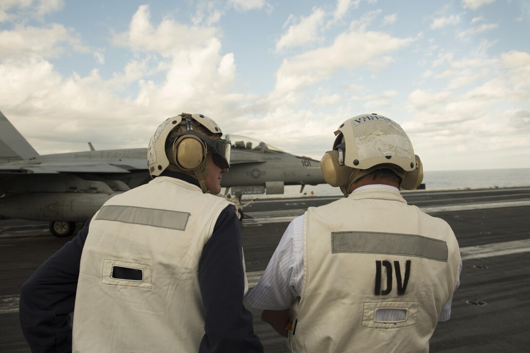 U.S. Defense Secretary Ash Carter, left, and Indian Defense Minister Manohar Parrikar observe flight operations during a tour of the USS Dwight D. Eisenhower in the Atlantic Ocean, Dec. 10, 2015. DoD photo by Air Force Senior Master Sgt. Adrian Cadiz