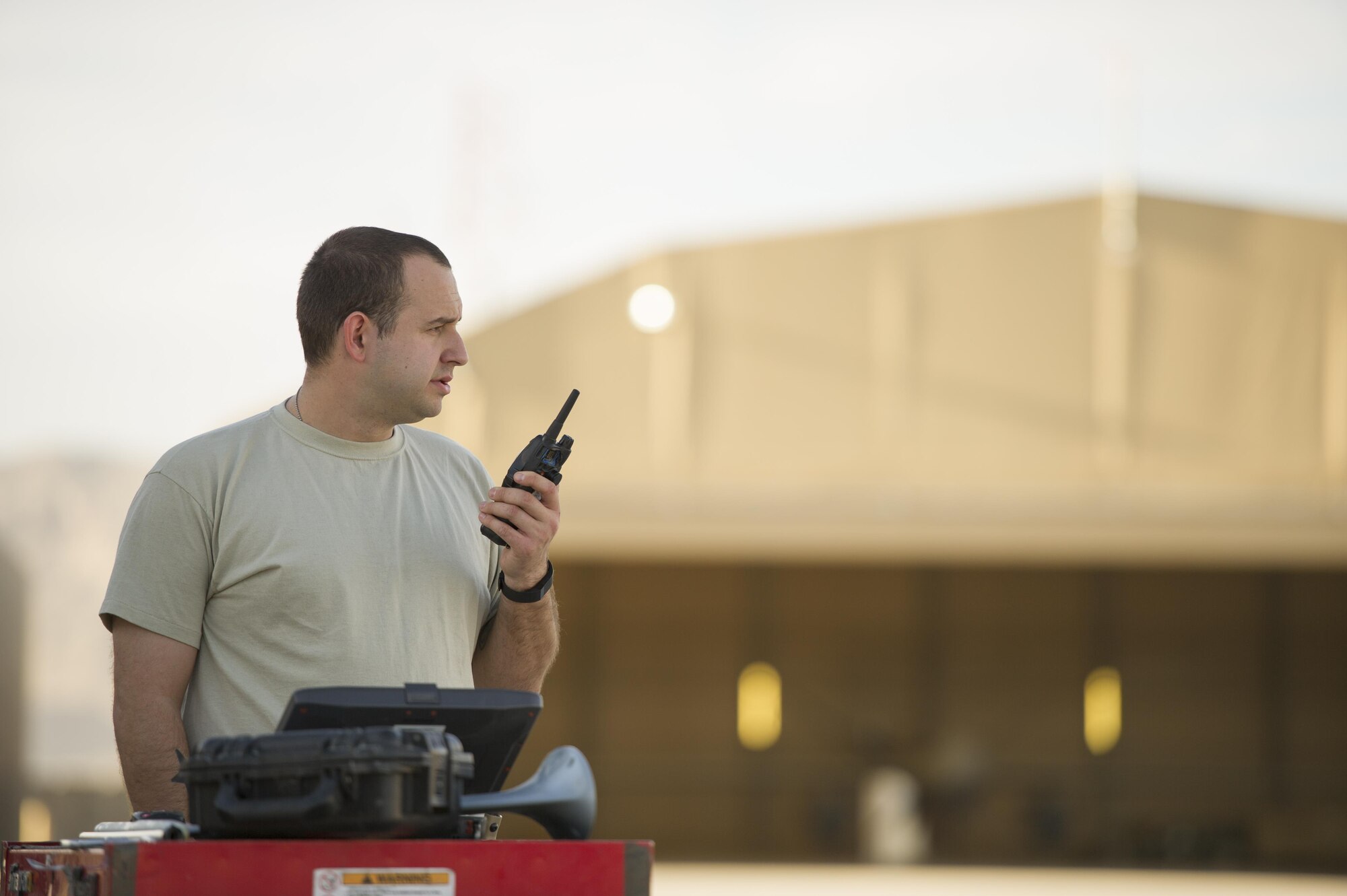 Tech. Sgt. Darren, 62nd Expeditionary Reconnaissance Squadron aircraft specialist, radios in the status of an MQ-9 Reaper before a sortie at Kandahar Airfield, Afghanistan, Dec. 5, 2015. The Reaper is an armed, multi-mission, medium-altitude, long-endurance remotely piloted aircraft that is employed primarily as an intelligence-collection asset and secondarily against dynamic execution targets. (U.S. Air Force photo by Tech. Sgt. Robert Cloys/Released)