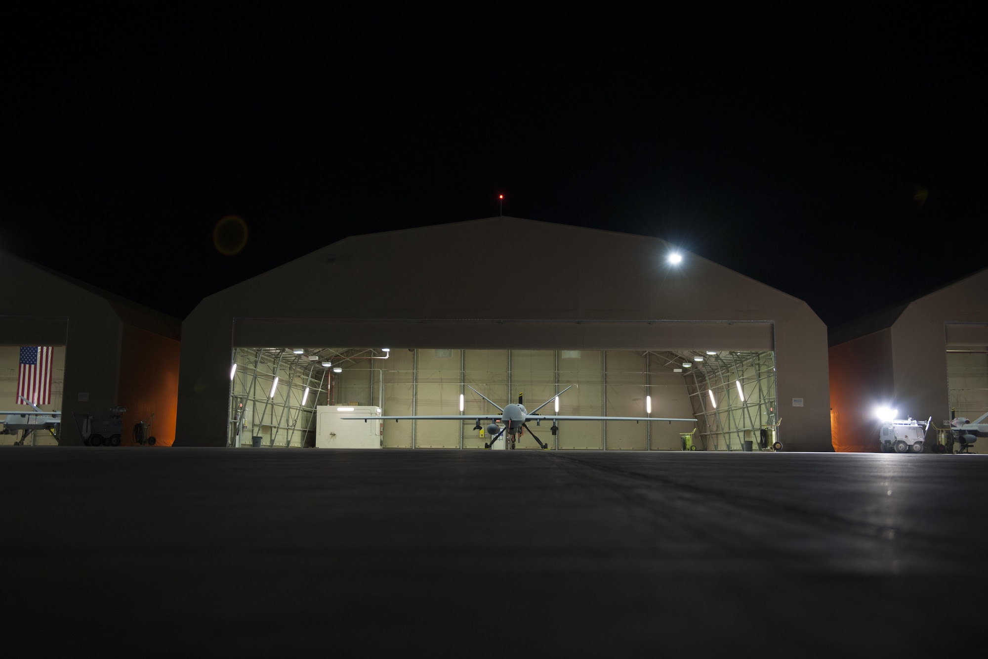 An MQ-9 Reaper equipped with an extended range modification from the 62nd Expeditionary Reconnaissance Squadron sits in a hanger at Kandahar Airfield, Afghanistan, Dec. 6, 2015. The ER modification allows for 20 to 40 percent additional flight time dependent on the aircraft's loadout. (U.S. Air Force photo by Tech. Sgt. Robert Cloys/Released)