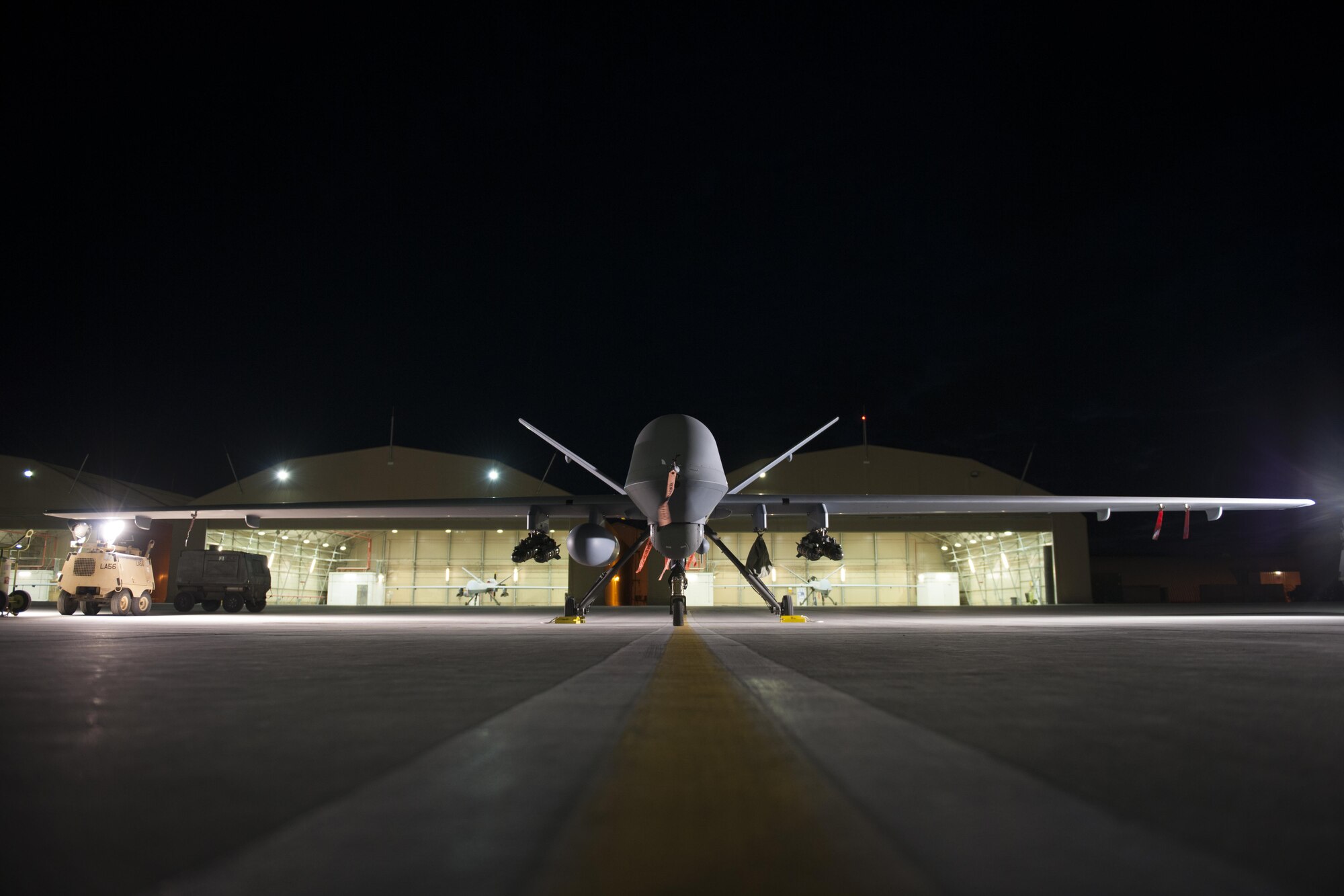 An MQ-9 Reaper equipped with an extended range modification from the 62nd Expeditionary Reconnaissance Squadron sits on the ramp at Kandahar Airfield, Afghanistan, Dec. 6, 2015. The ER modification allows for 20 to 40 percent additional flight time dependent on the aircraft's loadout. (U.S. Air Force photo by Tech. Sgt. Robert Cloys/Released)