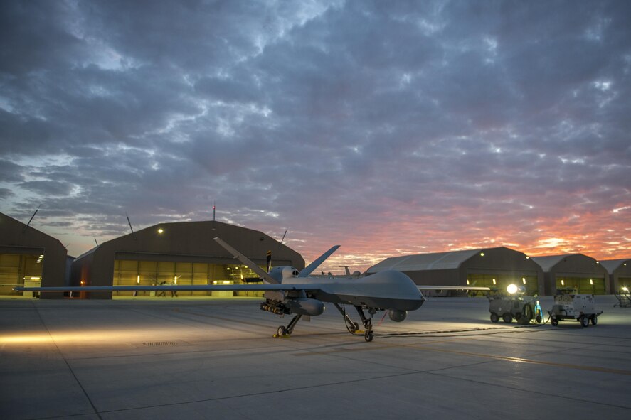 An MQ-9 Reaper equipped with an extended range modification from the 62nd Expeditionary Reconnaissance Squadron sits on the ramp at Kandahar Airfield, Afghanistan, Dec. 6, 2015. The ER modification allows for 20 to 40 percent additional flight time dependent on the aircraft's loadout. (U.S. Air Force photo by Tech. Sgt. Robert Cloys/Released)