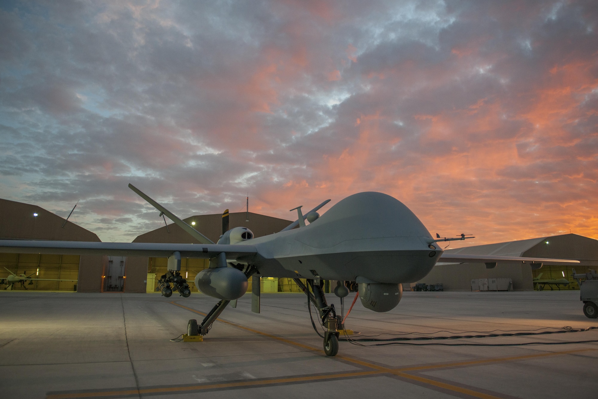 An MQ-9 Reaper equipped with an extended range modification from the 62nd Expeditionary Reconnaissance Squadron sits on the ramp at Kandahar Airfield, Afghanistan, Dec. 6, 2015. The ER modification allows for 20 to 40 percent additional flight time dependent on the aircraft's loadout. (U.S. Air Force photo by Tech. Sgt. Robert Cloys/Released)