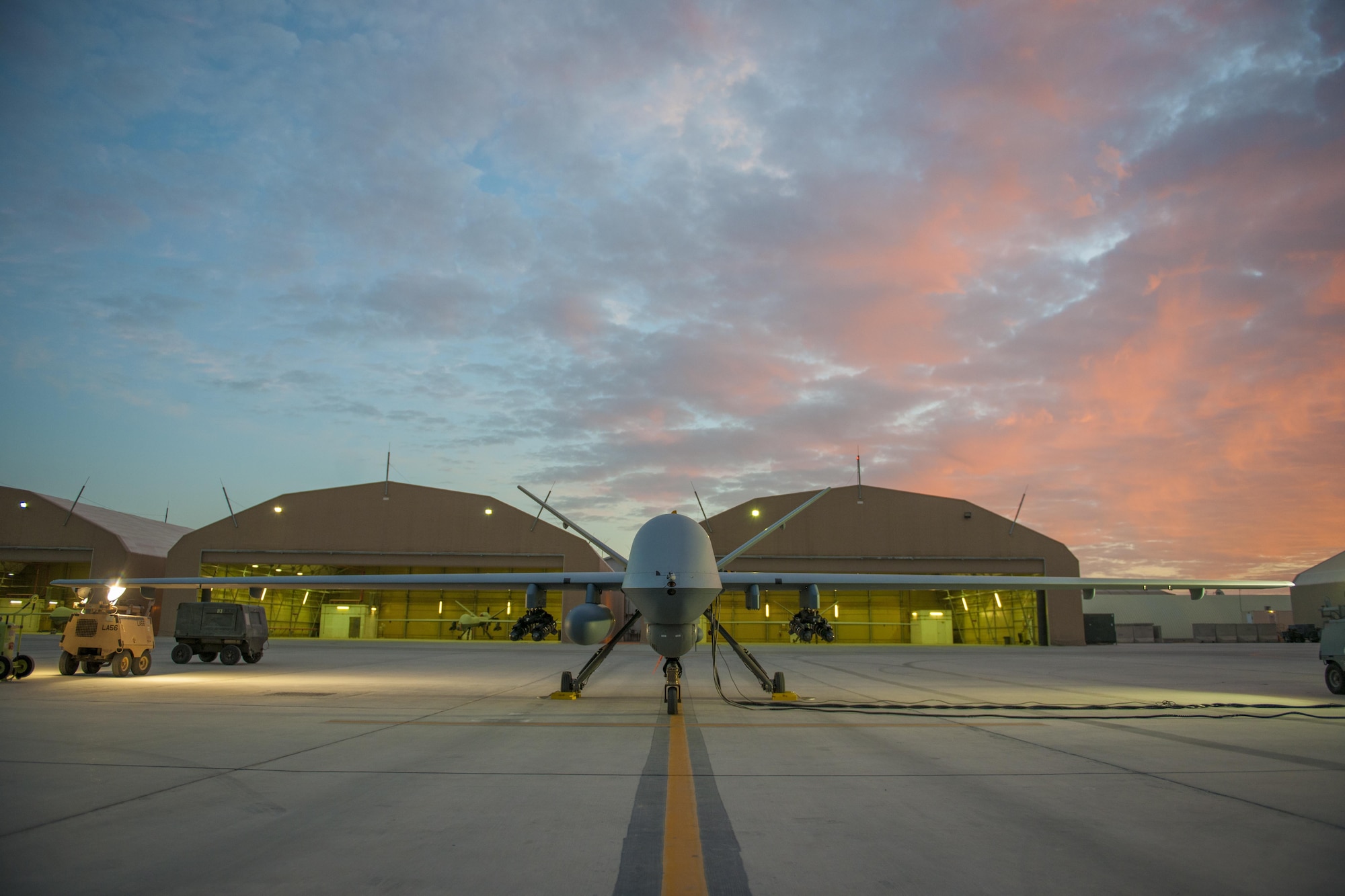 An MQ-9 Reaper equipped with an extended range modification from the 62nd Expeditionary Reconnaissance Squadron sits on the ramp at Kandahar Airfield, Afghanistan, Dec. 6, 2015. The ER modification allows for 20 to 40 percent additional flight time dependent on the aircraft's loadout. (U.S. Air Force photo by Tech. Sgt. Robert Cloys/Released)