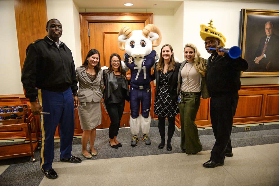 The Navy's mascot, Bill the Goat, poses with supporters during a pep rally Deputy Defense Secretary Bob Work hosted at the Pentagon, Dec. 10, 2015, before the upcoming Army-Navy football game. During the Dec. 12 game, cadets from the U.S. Military Academy at West Point, N.Y., will play midshipmen from the U.S. Naval Academy in Philadelphia. DoD photo by Army Sgt. 1st Class Clydell Kinchen
