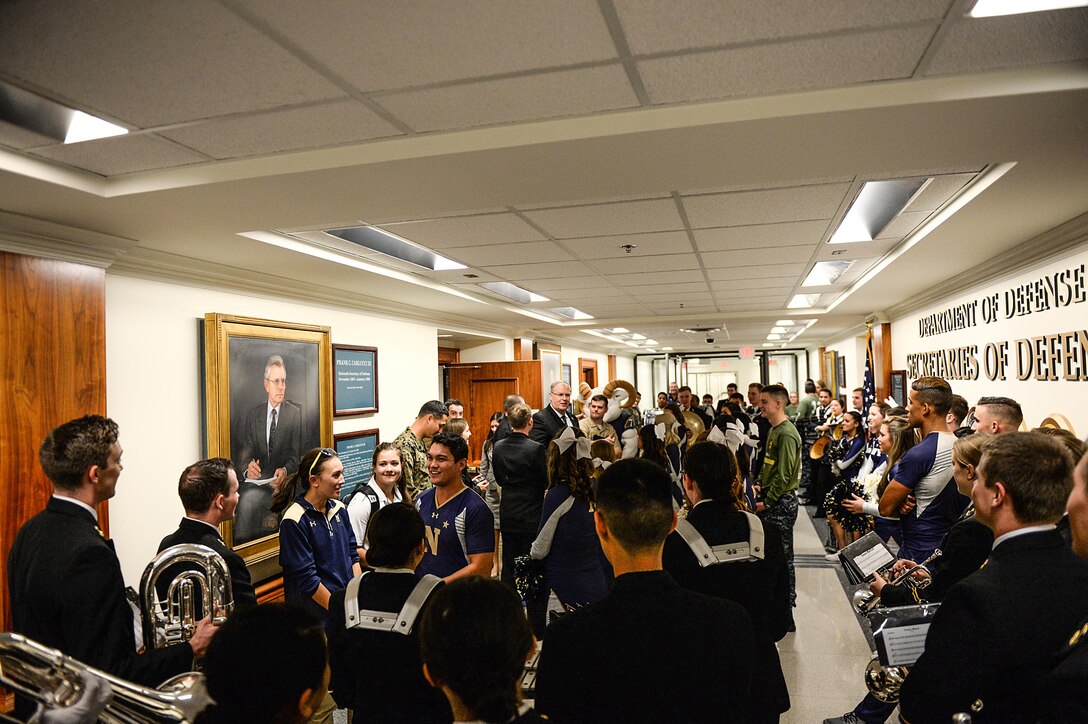 Deputy Defense Secretary Bob Work hosts a pep rally with Navy midshipmen at the Pentagon, Dec. 10, 2015, before the upcoming Army-Navy football game. DoD photo by Army Sgt. 1st Class Clydell Kinchen