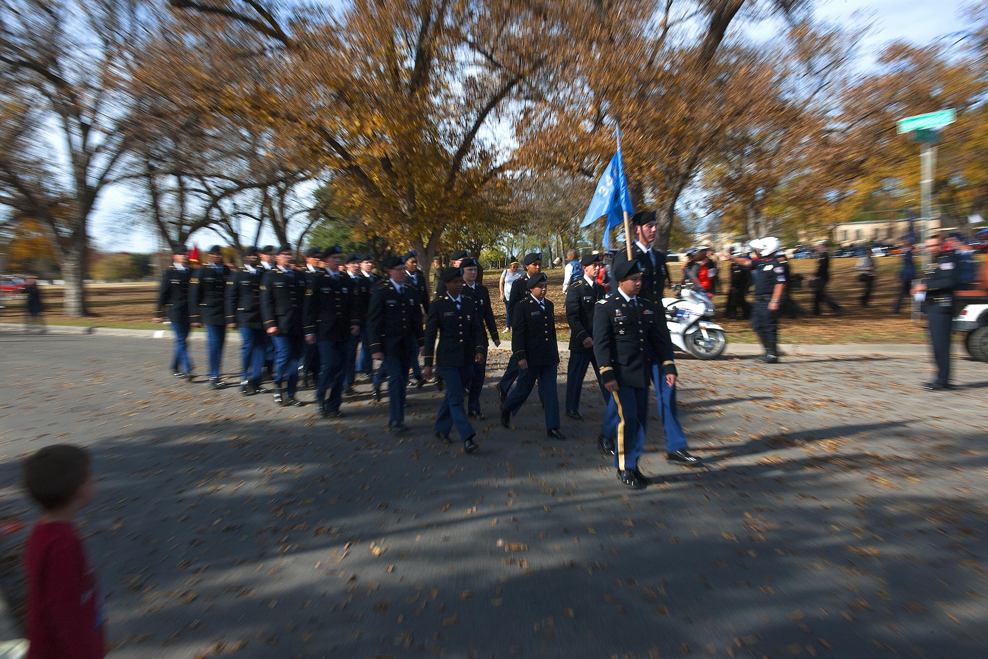 U.S. Army 344th Military Intelligence Battalion members march and sing jodies during the Heroes Parade in Sante Fe Park, San Angelo, Texas, Dec. 10, 2015. Volunteers from multiple branches on Goodfellow Air Force Base came to march in the parade to support the Wounded Warriors. (U.S. Air Force photo by Airman 1st Class Caelynn Ferguson/Released)

