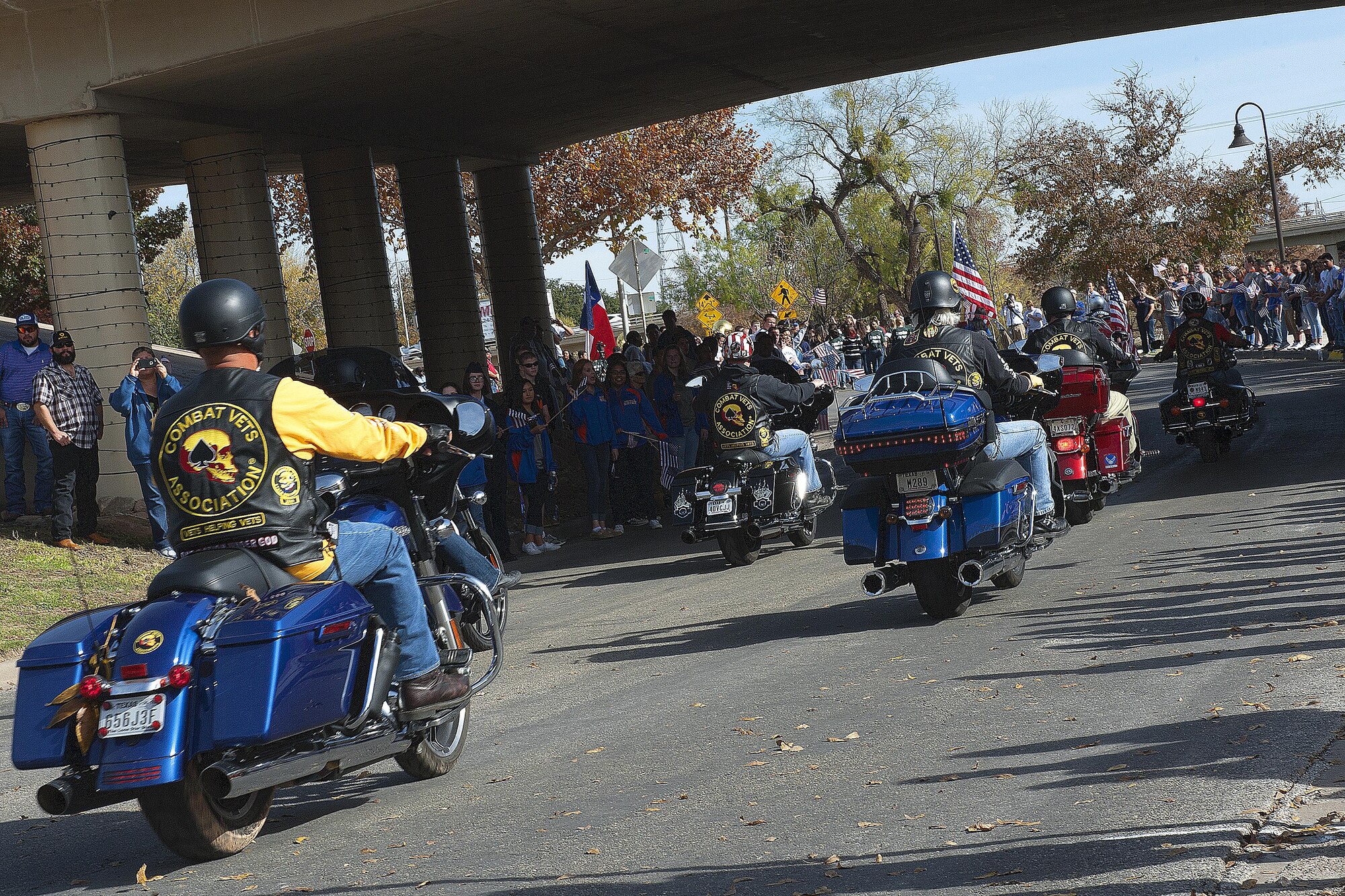 Local motorcycle groups that supported veterans came to drive through the Heroes Parade in Sante Fe Park, San Angelo, Texas, Dec. 10, 2015. The parade honored selected Wounded Warriors and provided them the opportunity to connect with various communities and support groups. (U.S. Air Force photo by Airman 1st Class Caelynn Ferguson/Released)

