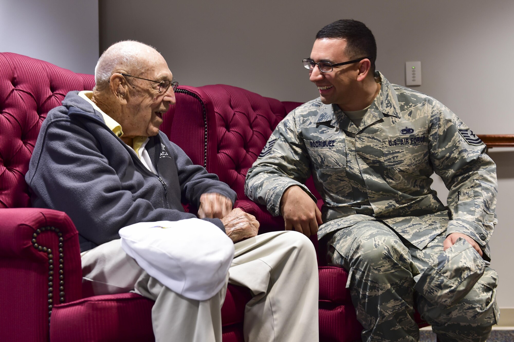 Tech. Sgt. Corey Rodriguez, an assistant specialist section chief with the 901st Special Operations Aircraft Maintenance Squadron, talks to retired Lt. Col. Richard E. Cole, a Doolittle Raider, at the 319th Special Operations Squadron, Hurlburt Field, Fla., Dec. 9, 2015. Cole, one of the last surviving Doolittle Raiders, was the co-pilot for Lt. Col. James H. “Jimmy” Doolittle during the Doolittle Raid on Tokyo, Japan, April 18, 1942. (U.S. Air Force photo by Senior Airman Jeff Parkinson)