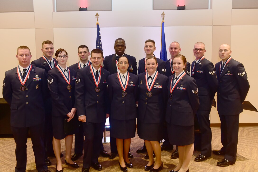 Buckley Airman Leadership School Class 16-A stand together after their graduation Dec. 10, 2015, at the Leadership Development Center on Buckley Air Force Base, Colo. The class included Senior Airmen Evan Joacin, Air Reserve Personnel Center contact center counselor, and Christopher West, ARPC retirements service team technician. This graduation represents an important part of the enlisted force professional military education, teaching valuable skills required for supervisors. (U.S. Air Force photo by Luke W. Nowakowski)