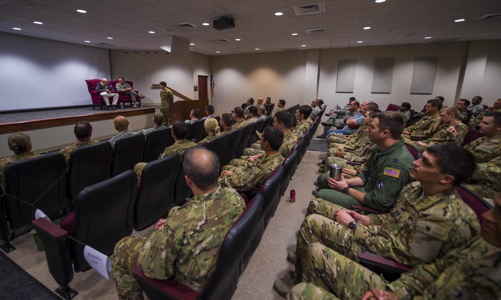 Members of the 319th Special Operations Squadron attend a question and answer session with retired Lt. Col. Richard E. Cole, a Doolittle Raider, at the 319th SOS, Hurlburt Field, Fla., Dec. 9, 2015. Air Commandos asked Cole various questions about his experiences during his time in service and as a member of the Doolittle Raid on April 18, 1942. (U.S. Air Force photo by Staff Sgt. Marleah Robertson)