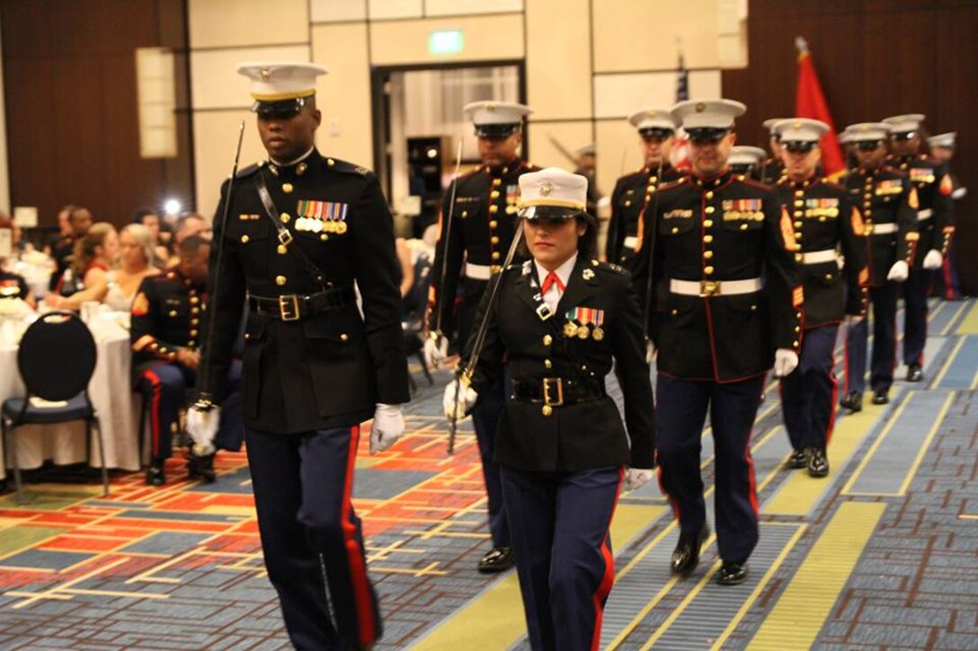 Marines with Recruiting Station Atlanta march in during the opening precession during of the Marine Corps Birthday Ball Nov. 14, 2015, at the Atlanta Gateway Marriott Hotel in Atlanta, Ga. It is a proud tradition Marines hold to celebrate the Marine Corps birthday every year since Nov. 10, 1775 when the Marine Corps when the Corps was established at the Tun Tavern in Philadelphia, Penn.(Official Marine Corps photo by Sgt. Mel Johnson/Released)