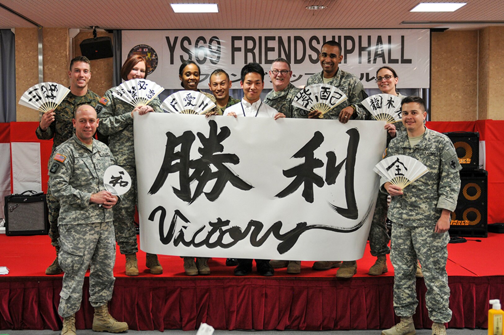 Yama Sakura 69 Soldiers learn calligraphy on Camp Itami, Japan, Dec. 7, 2015. As part of YS 69, exercise participants are given the opportunity to learn about Japanese culture through events and trips. 